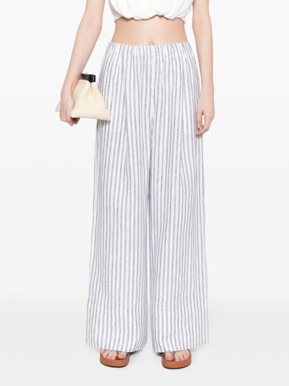 Reformation
Fernando linen trousers

$178